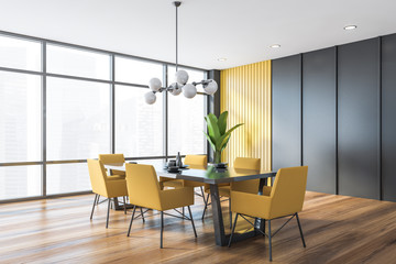 Gray and yellow dining room corner