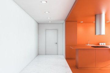 Orange and white kitchen interior with island