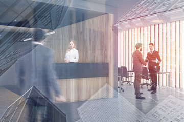 Business people near wooden office reception