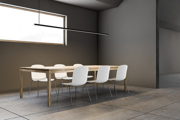 Attic gray dining room corner with long table