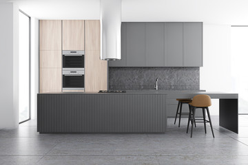 Gray and wooden kitchen interior with bar