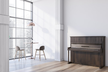 White cafe interior with piano