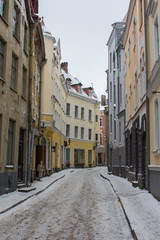 Narrow street in Old Town Tallinn in winter. Estonia