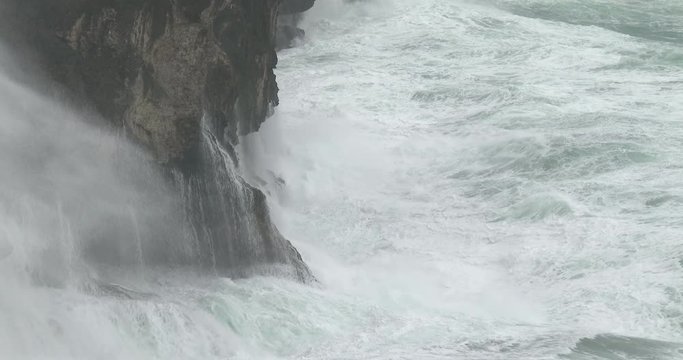 Huge Hurricane Waves Crash Into Rugged Rocky Coastline - Vong
