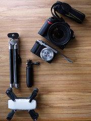 photography equipment on a table, digital camera, background template, tripod