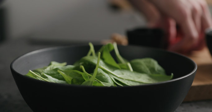 Closeup Making Salad With Spinach, Tomatoes And Mozzarella