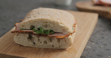 sandwich with smoked pork, spinach and pesto