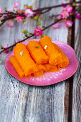 Thai desserts, Foi Tong (Shredded Egg Yolk Tart) It’s  ingredients used  Egg yolks and sugar are boiled in sweet syrup and then formed into hairlike shapes.