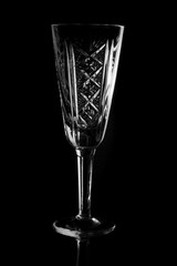 glass of wine on black background