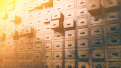 Old wooden textured drawers background in chinese herbal medicine shop in china.Vintage asian objects.