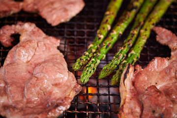 BBQ, asparagus and pork on grill 