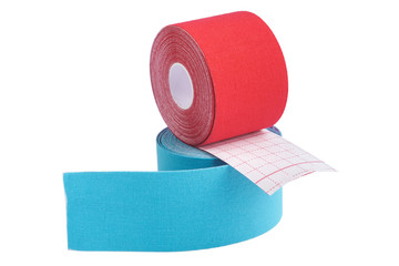 Stack of two rolls kinesiology tape for athletes isolated on white background.