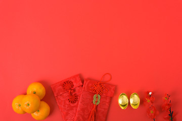Chinese new year festival concept, flat lay top view, Happy Chinese new year with Red envelope and gold ingot
