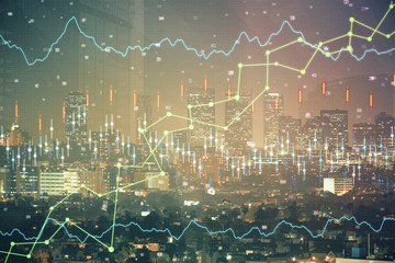 Financial graph on night city scape with tall buildings background multi exposure. Analysis concept.