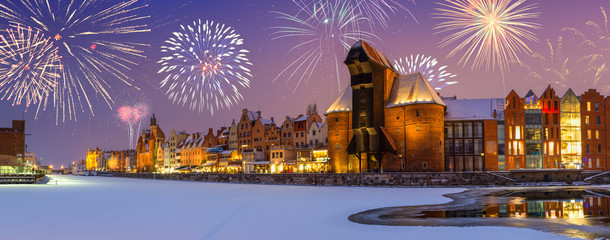 Happy New Year fireworks.Winter scenery in Gdansk at night, Poland, Europe.