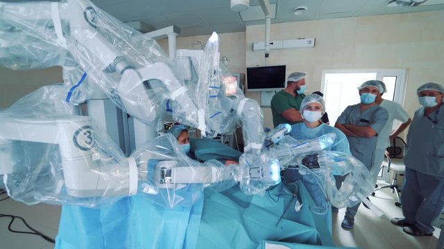 Operating room, medical surgical robot, cancerous tumor removal surgery. Robotic surgery. Future of Medicine