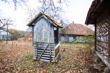 Old wooden water well, abandoned farmhouse