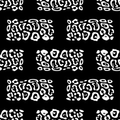 Spots of a Leopard. Ethnic boho seamless pattern. Lace. Embroidery on fabric. Patchwork texture. Weaving. Traditional ornament. Tribal pattern. Folk motif. Vector illustration for web design or print.