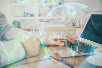 Multi exposure of stock market chart with man working on computer on background. Concept of financial analysis.