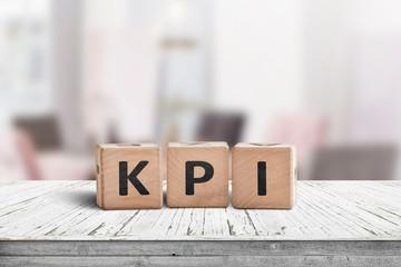 KPI word on a wooden sign in a bright environment