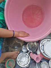 Cleaning the utensils.