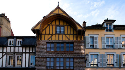 Fototapeta na wymiar Coloured medieval half-timbered houses in the city of Troyes in France