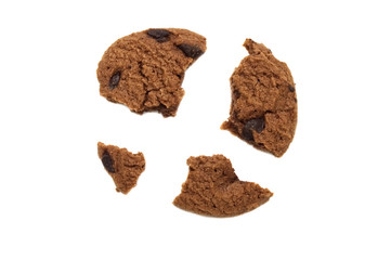 Biscuit with chocolate chip flavored. Some broken and crumbs of crunchy delicious sweet meal and useful cookie. Isolated on white background.