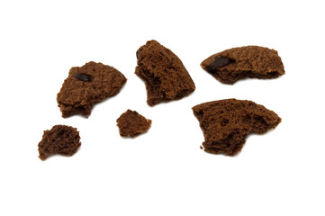 Biscuit with chocolate chip flavored. Some broken and crumbs of crunchy delicious sweet meal and useful cookie. Isolated on white background.