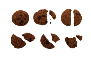 Biscuit with chocolate chip flavored. Some broken and crumbs of crunchy delicious sweet meal and useful cookie. Isolated on white background.