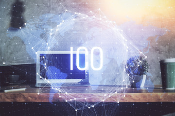 Multi exposure of blockchain theme hologram and table with computer background. Concept of bitcoin...