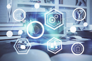 Computer on desktop with social network theme icon. Multi exposure. Concept of international connections.