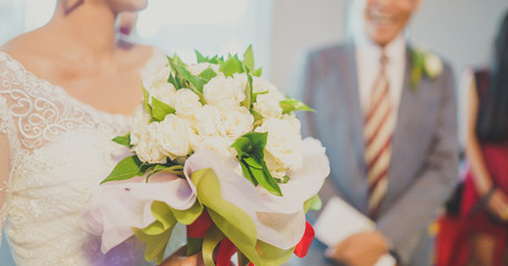 Wedding bouquet made of white roses. Valentinese day concept.