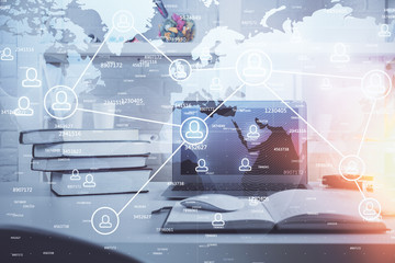 Computer on desktop with social network theme icon. Multi exposure. Concept of international connections.