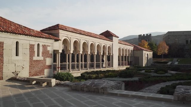 Gimbal shot of column path in medieval casle with middle eastern architecture