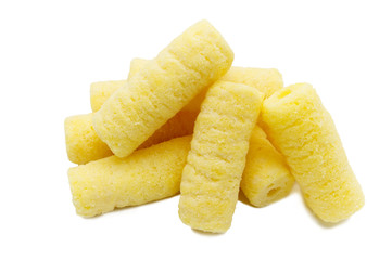 Handful of sweet crunchy corn sticks, snacks isolated on white background.