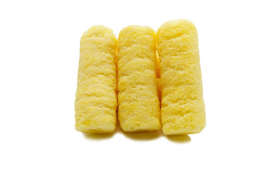 Handful of sweet crunchy corn sticks, snacks isolated on white background.
