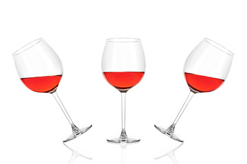 Three glasses of rose wine half filled isolated on white background.