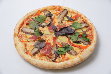 pizza with ham and tomatoes on white