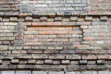 brick wall. old ruined building. Building ready to be demolished. Texture. Empty background.