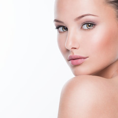 Fototapeta premium Beautiful face of young woman with perfect health fresh skin