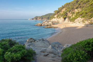 Fototapeta na wymiar Lloret de Mar beach Cala de Boadella. Scenic view on beautiful coast in Costa Brava. Spanish sea landscape
