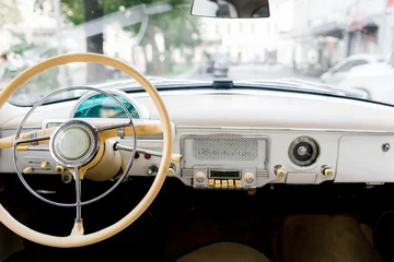 Foto op Aluminium Interior of a classic vintage car. Old car © kalinichenkod