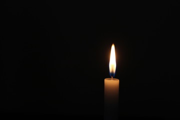 Fototapeta na wymiar lit candle