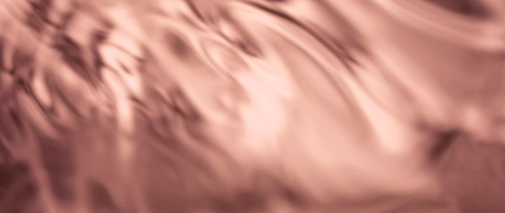 abstract rose gold Metal texture. Elegant soft pink gold background.