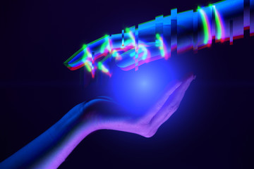 Woman and robot's hands as symbol of partnership between people and technology.