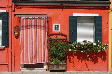 Fototapeta na wymiar Window and door, red fasade