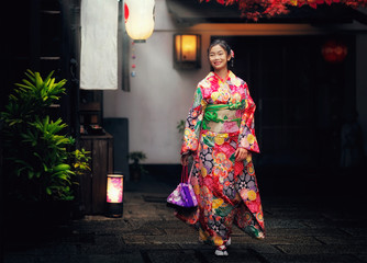 Japannese girl with kimono dress - obrazy, fototapety, plakaty