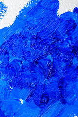 Blue color 2020. Oil paint strokes on white background. Art background. Vertical photo. Classic blue