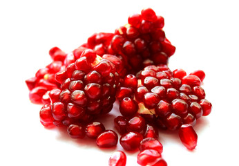 pomegranate seeds isolated on white background