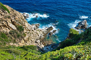 Barcelona, Spain - 18.08.2019: Rocky spanish coast and blue sea in spain